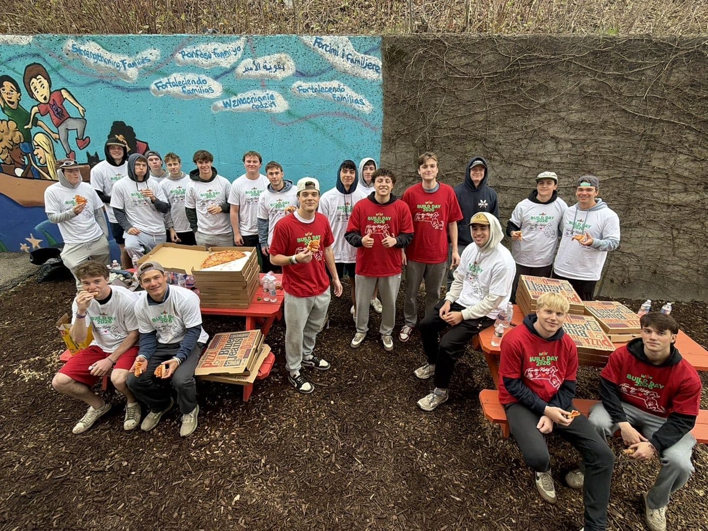 A Build Day volunteer crew taking a break at their site